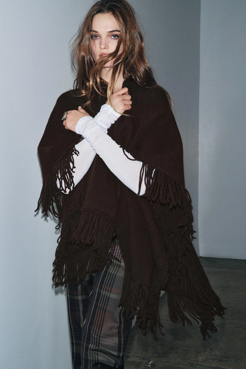 FRINGED KNIT CAPE