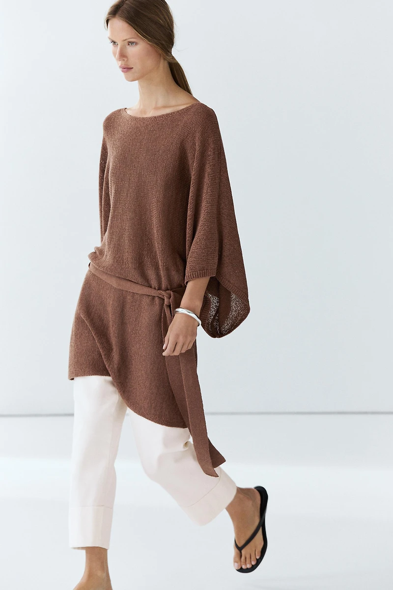 Pull en maille de coton avec ceinture