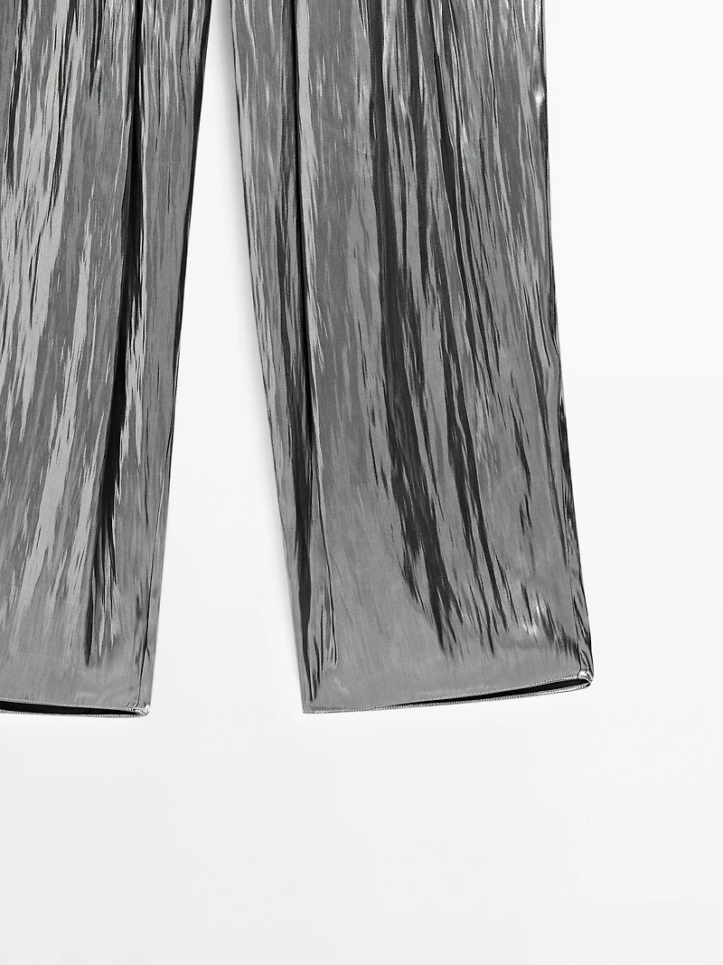 Flowing metallic trousers with gathered detail