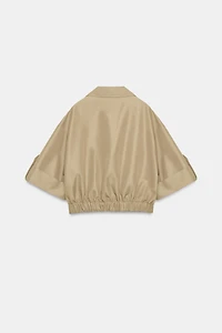 SHORT TRENCH WITH ROLLED SLEEVES