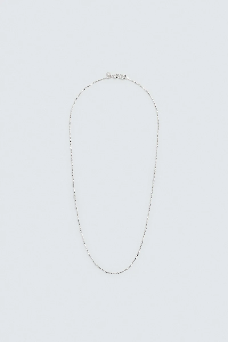 CHAÎNE À MAILLONS MÉTALLIQUES COMBINÉS