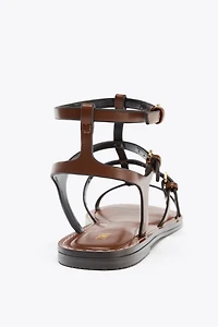 STRAPPY BUCKLE SANDALS