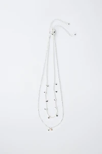 PACK OF TWO STAR NECKLACES