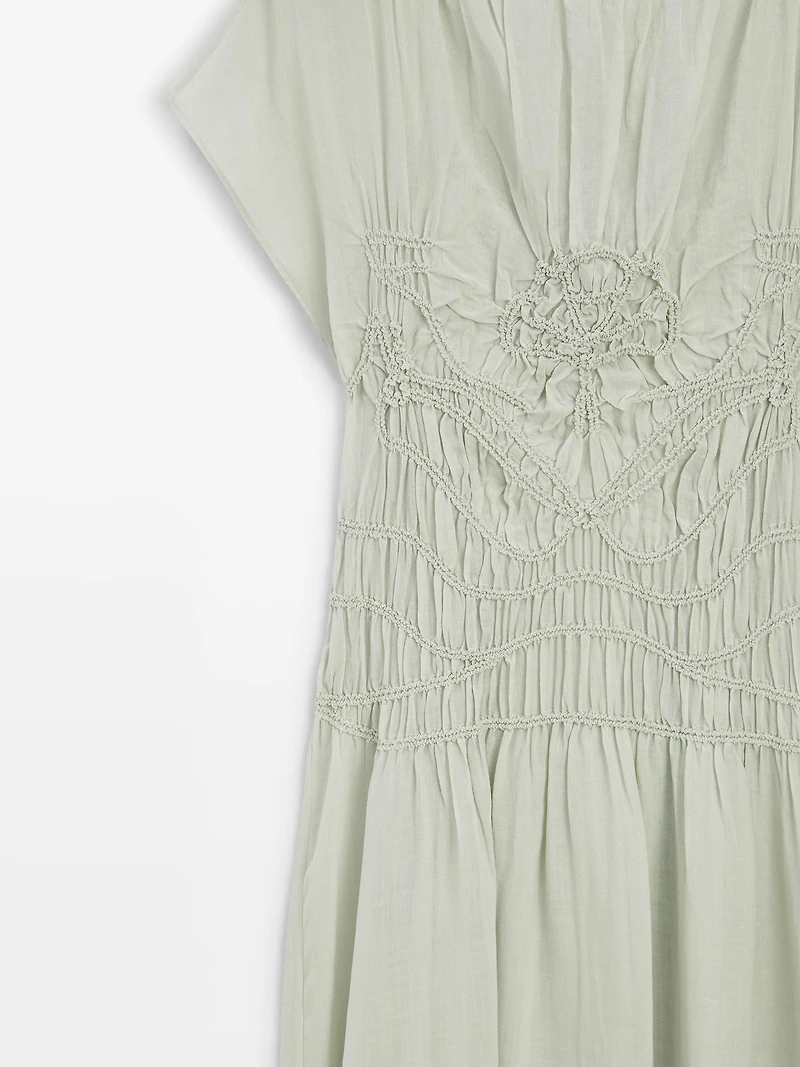 Long flowing dress with embroidered details