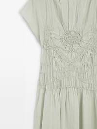 Long flowing dress with embroidered details