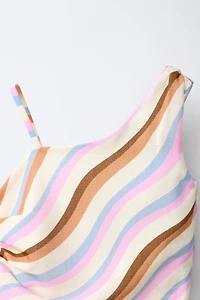 ASYMMETRIC WAVE TOP