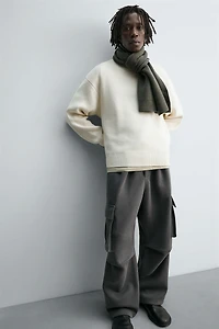 NEOPRENE EFFECT CARGO PANTS WITH PLEATS