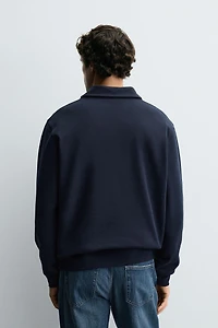 INTERLOCK ZIP POLO SWEATSHIRT