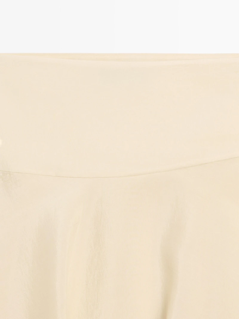 Flowing asymmetric midi skirt