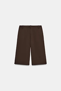 LONG PLEATED SHORTS