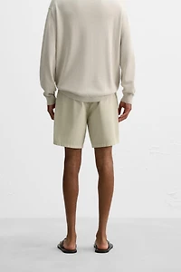 WASHED COTTON BERMUDA SHORTS
