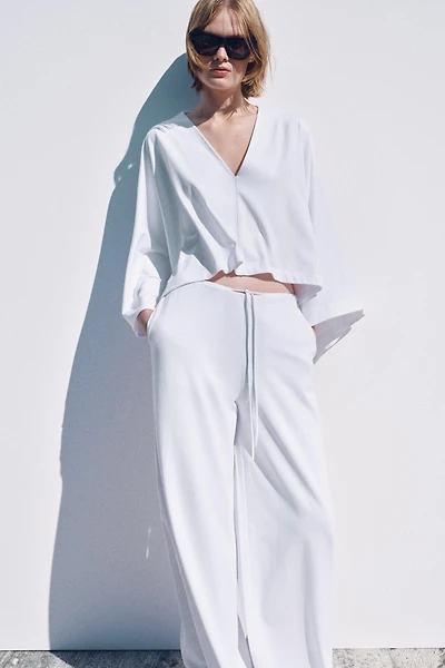 VOLUMINOUS HEAVY COTTON CAPE TOP