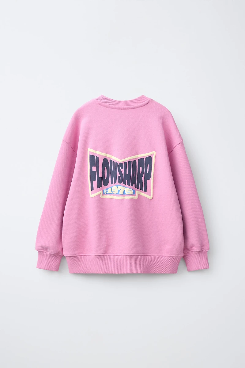 RAISED TEXT SWEATSHIRT