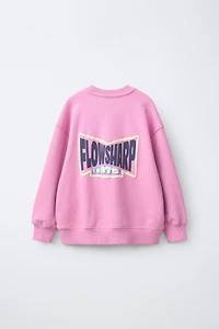 RAISED TEXT SWEATSHIRT
