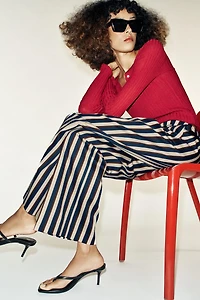 PANTALON À RAYURES ET CEINTURE
