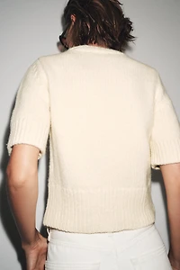 PULL EN MAILLE MANCHES COURTES