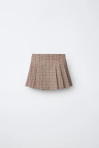 JUPE À PLIS PLATS CARREAUX AVEC BOUTONS