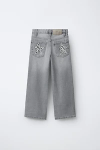 WIDE LEG JEANS WITH ANIMAL PRINT STAR PATCHES