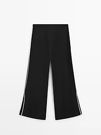 Linen trousers with contrast trim