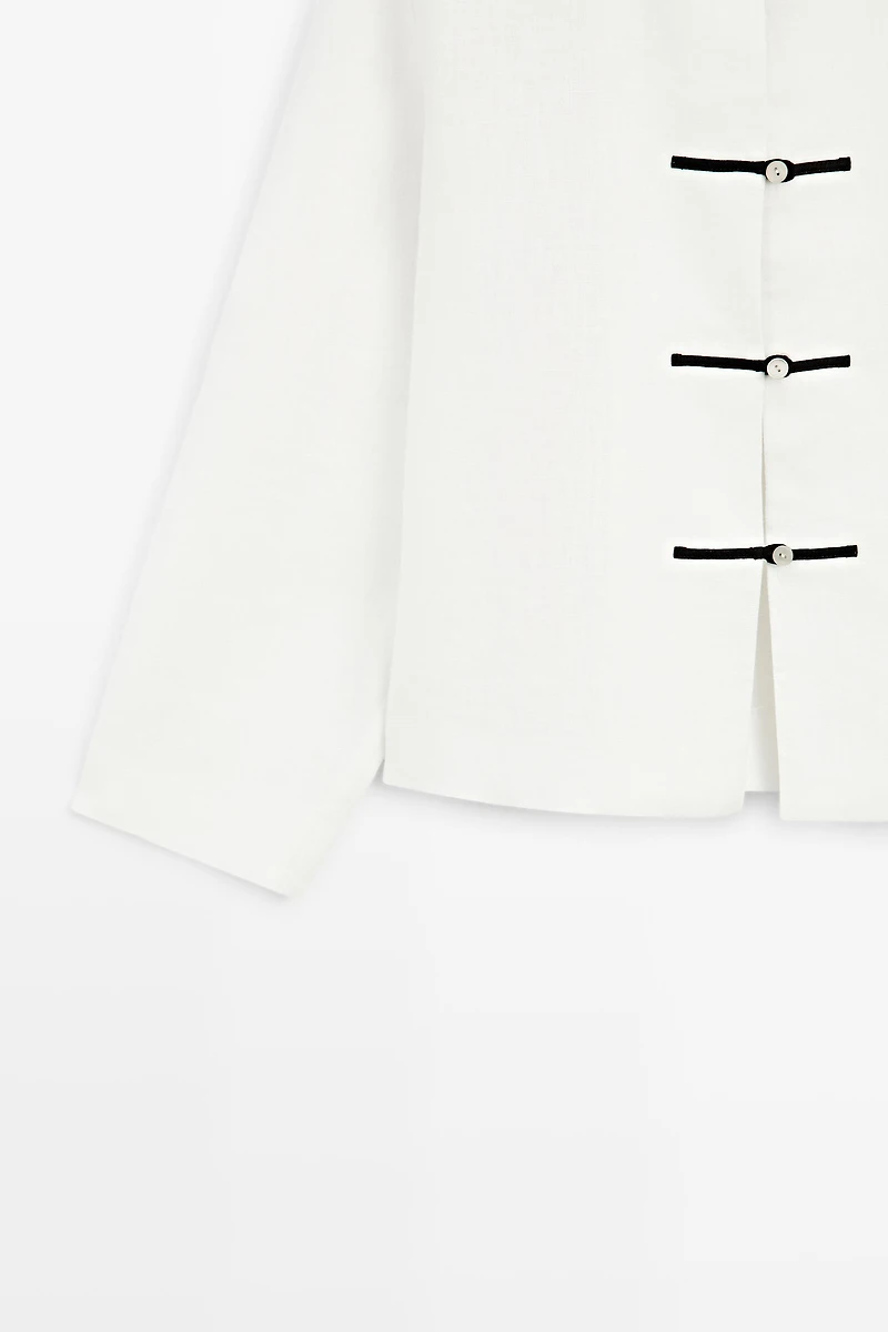 100% linen flowing shirt with button detail