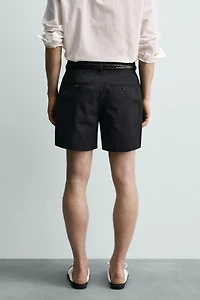 SHORT PLISSÉ COURT AARON LEVINE X ZARA