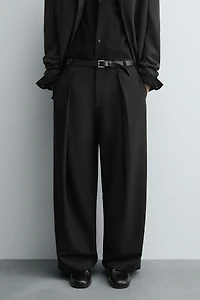 RELAXED FIT PLEATED PANTS