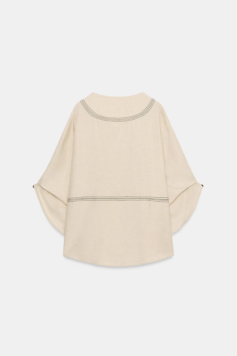 CHEMISE OVERSIZE EN LIN À SURPIQÛRES CONTRASTÉES