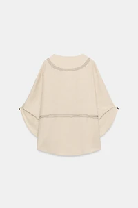 CHEMISE OVERSIZE EN LIN À SURPIQÛRES CONTRASTÉES