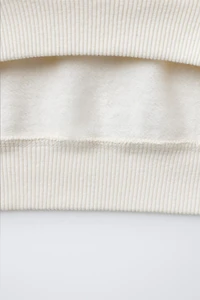 FAUX SHEARLING REINDEER PATCH SWEATSHIRT