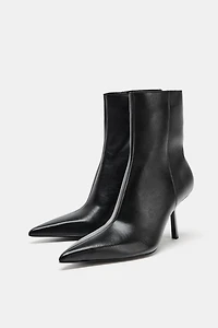 BOTTINES À TALONS EN CUIR