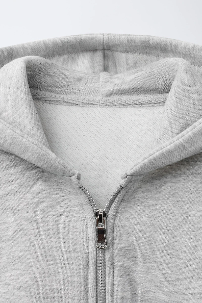 SWEAT BASIQUE ZIPPÉ