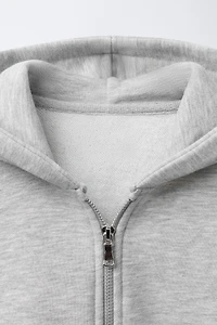 SWEAT BASIQUE ZIPPÉ