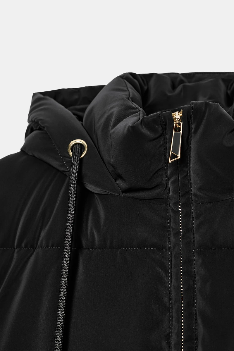GILET LONG MATELASSÉ À CAPUCHE