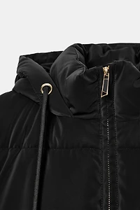 GILET LONG MATELASSÉ À CAPUCHE