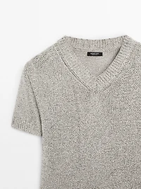 Knit sweater with fabric detail