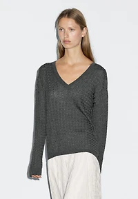 V-neck cable-knit sweater