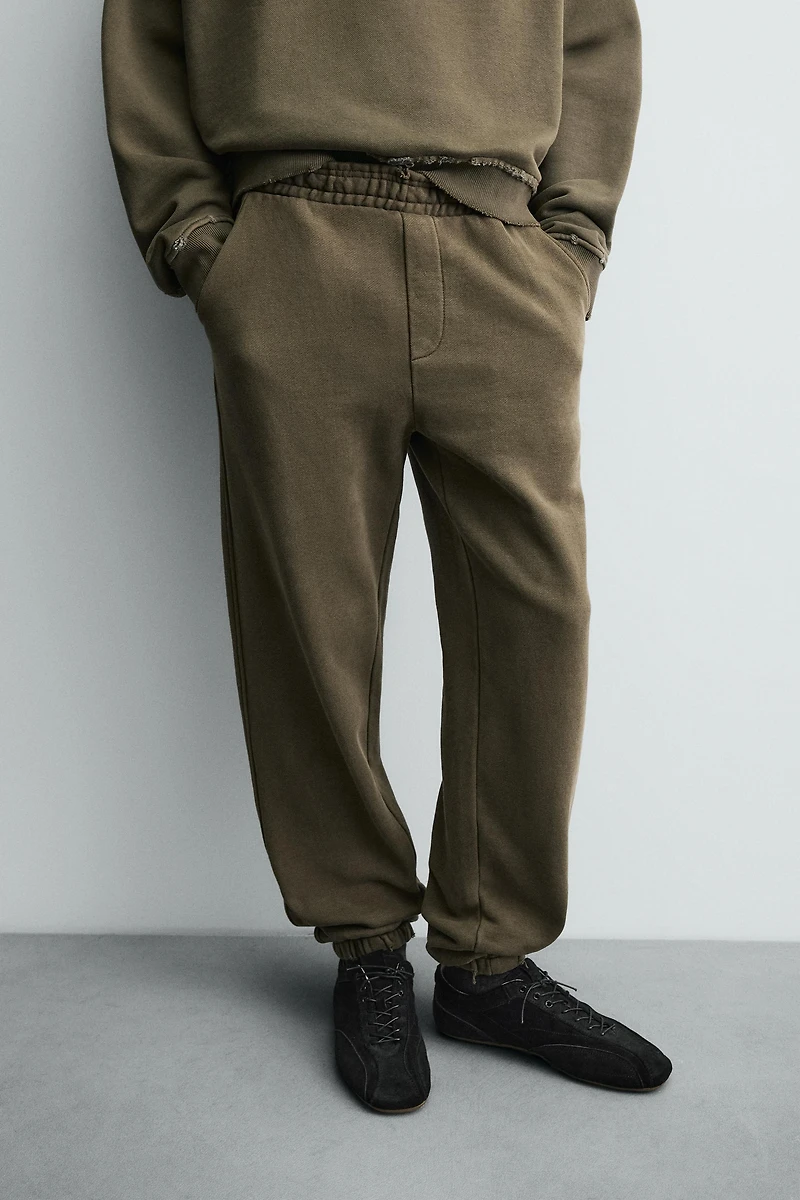WASHED EFFECT RELAXED FIT PANTS