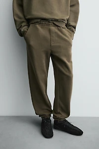 WASHED EFFECT RELAXED FIT PANTS