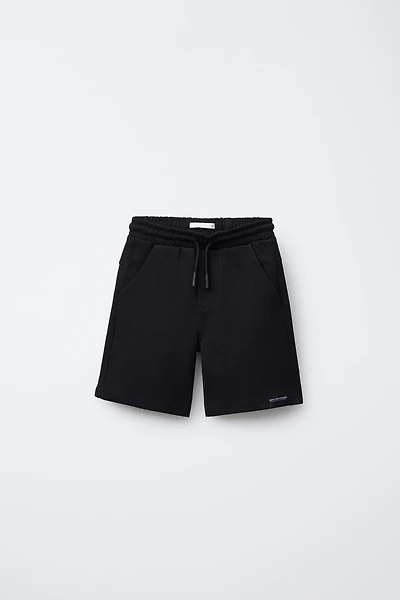COMFORT STRAIGHT PLUSH SHORTS