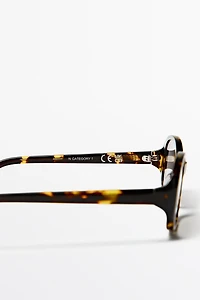 Oval tortoiseshell-effect sunglasses