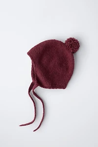 KNIT POMPOM BONNET