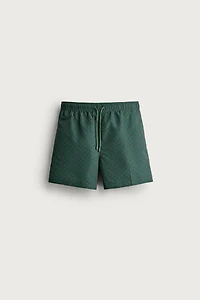 GEOMETRIC PRINT MID-LENGTH SWIM TRUNKS