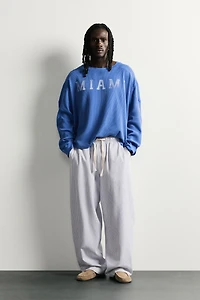 STRIPED WIDE FIT PANTS