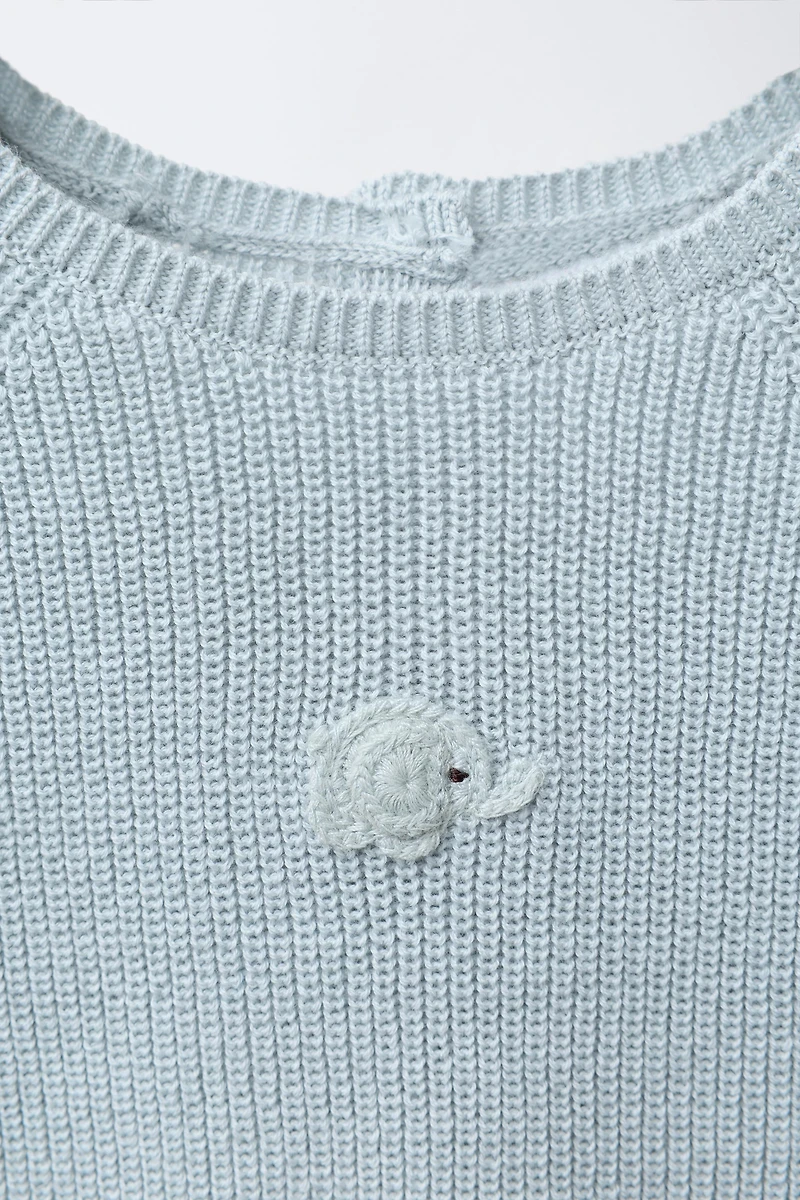 EMBROIDERED ELEPHANT PURL KNIT SWEATER