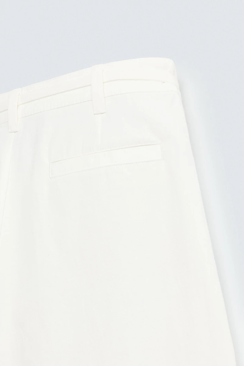 RELAXED FIT PLEATED PANTS