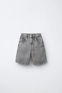 DENIM SHORTS WITH STAR AND TEXT