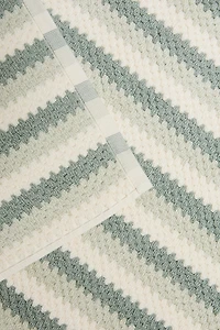 TAPIS DE BAIN JACQUARD GÉOMÉTRIQUE