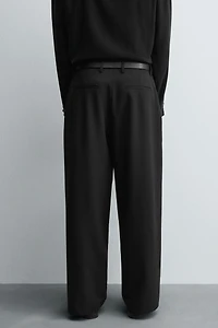 RELAXED FIT PLEATED PANTS