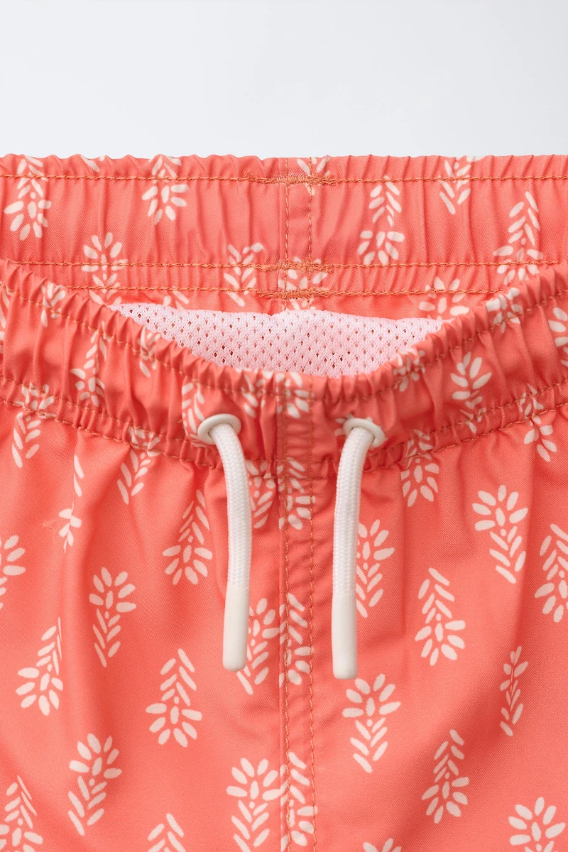 AGES 6-14 / PRINTED SWIM SHORTS