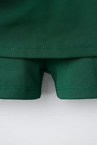 CONTRAST PIPING BOX PLEAT SKIRT